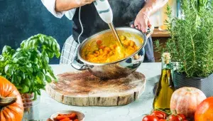Chef with blender make Pumpkin soup