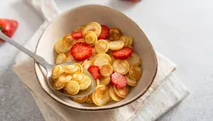 Mini pancake cereal with strawberries