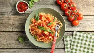 Pasta with tomato sauce and basil