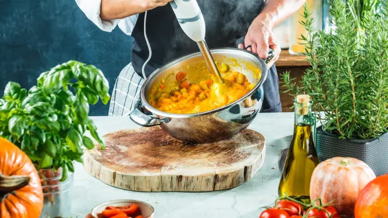 Chef with blender make Pumpkin soup