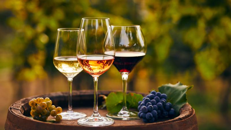 Three glasses of white, rosé and red wine