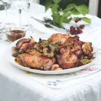 Pomalu pečený králík s česnekem, cibulí a bylinkami