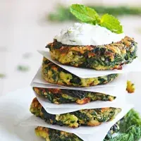 Zucchini, Feta, and Spinach Fritters with Garlic Tzatziki
